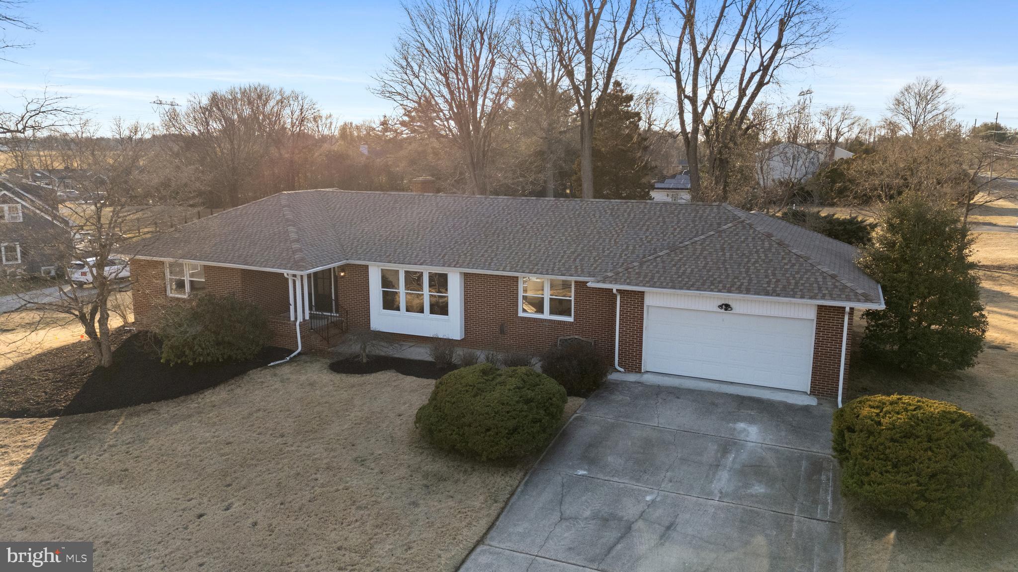 7 Maple Road Eastampton, NJ 08060 - Photo 59 of 62 a front view of a house with a yard and garage