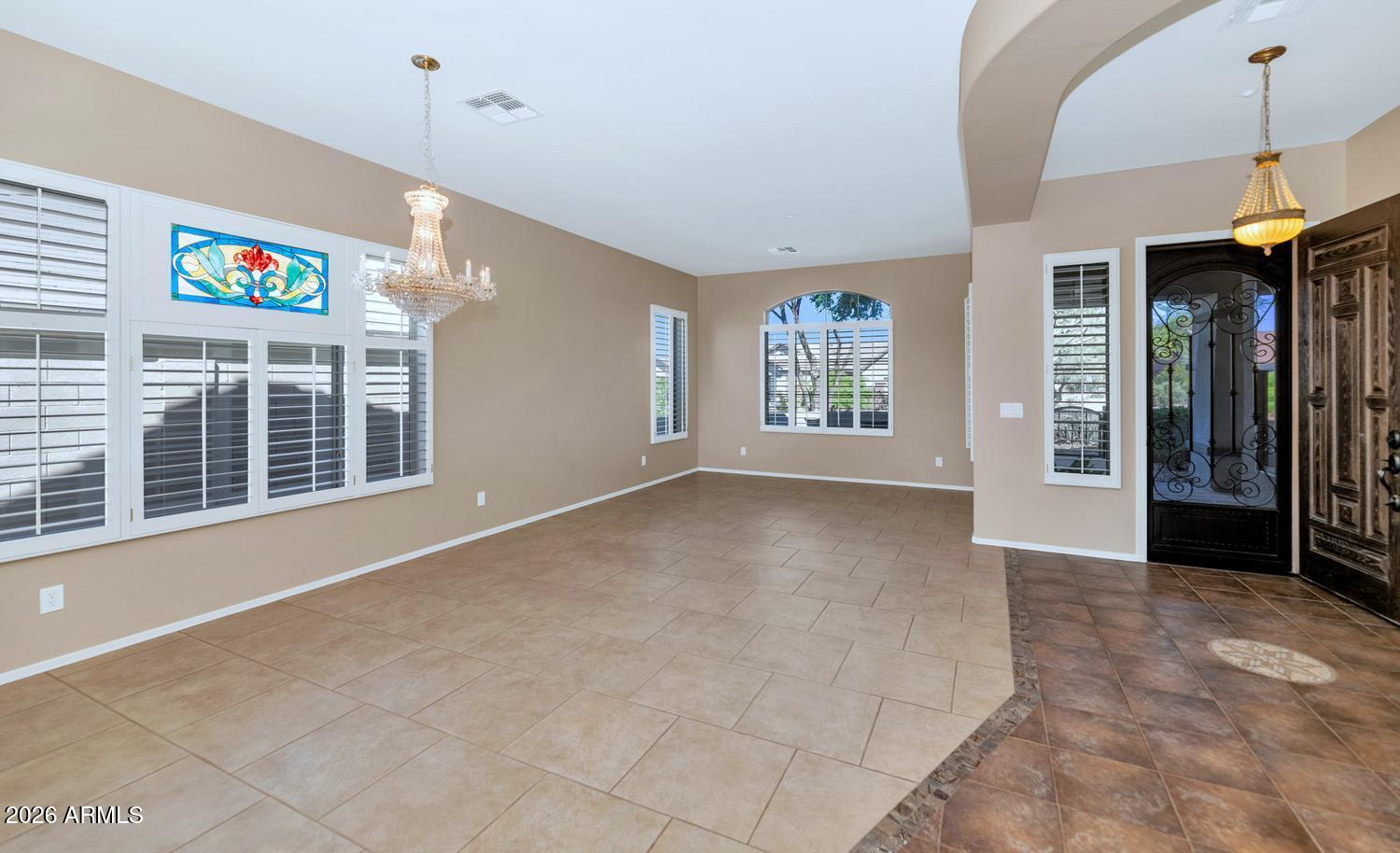 41123 North River Bend Road Phoenix, AZ 85086 - Photo 7 of 45 a view of an empty room with a window