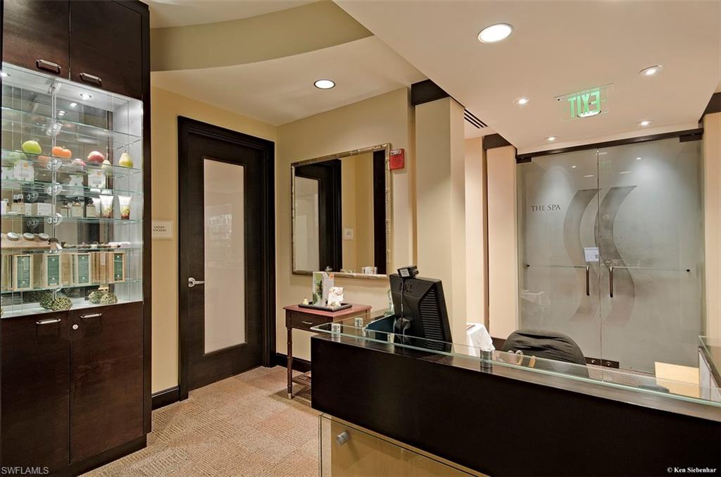 1035 Sandpiper Street, Unit F104 Naples, FL 34102 - Photo 20 of 24 a view of a bathroom with dual sinks