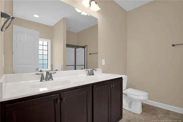 a white bath tub sitting next to a window