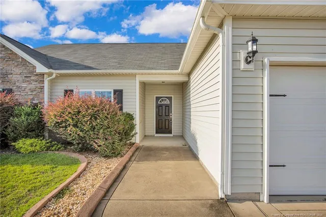 a view of a pathway with a house