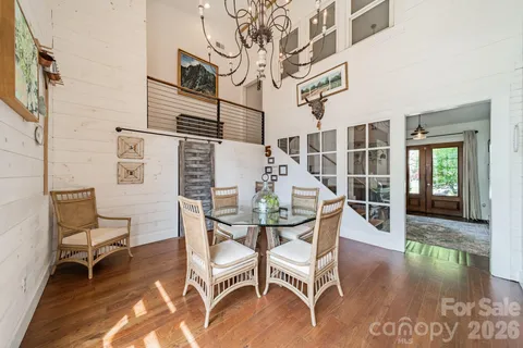 a patio with a table and chairs