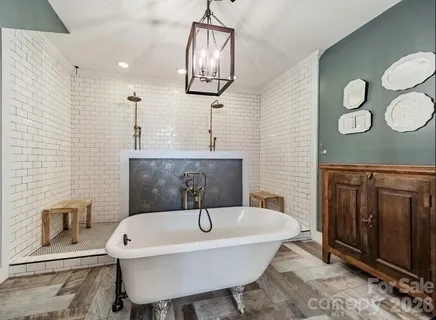 a bathroom with a bathtub a sink and a toilet
