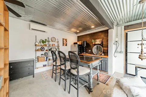 a bathroom with a sink and mirror