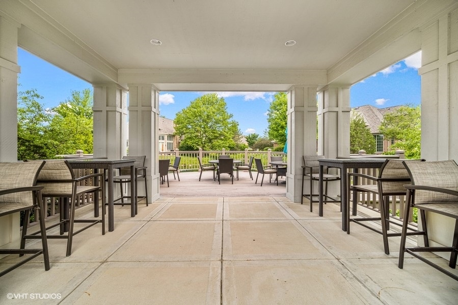 857 Country Club Lane Northbrook, IL 60062 - Photo 23 of 27 a view of a dining room with furniture window and outside view