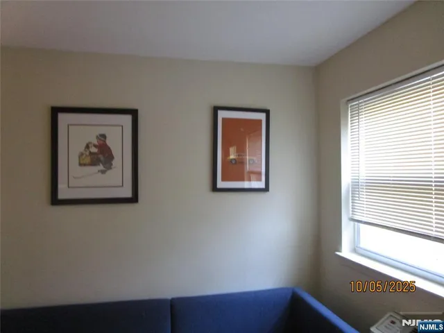 a view of a hallway with a window