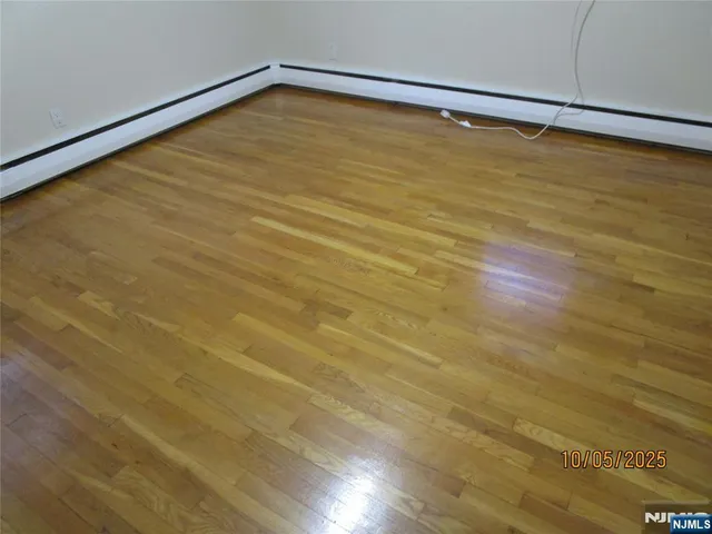 a view of a big room with wooden floor