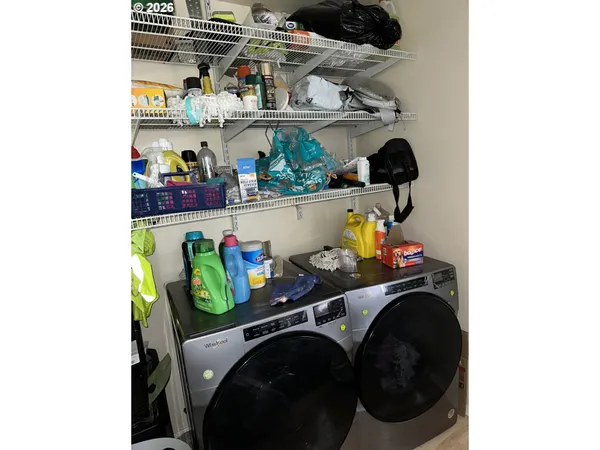 a utility room with dryer and washer