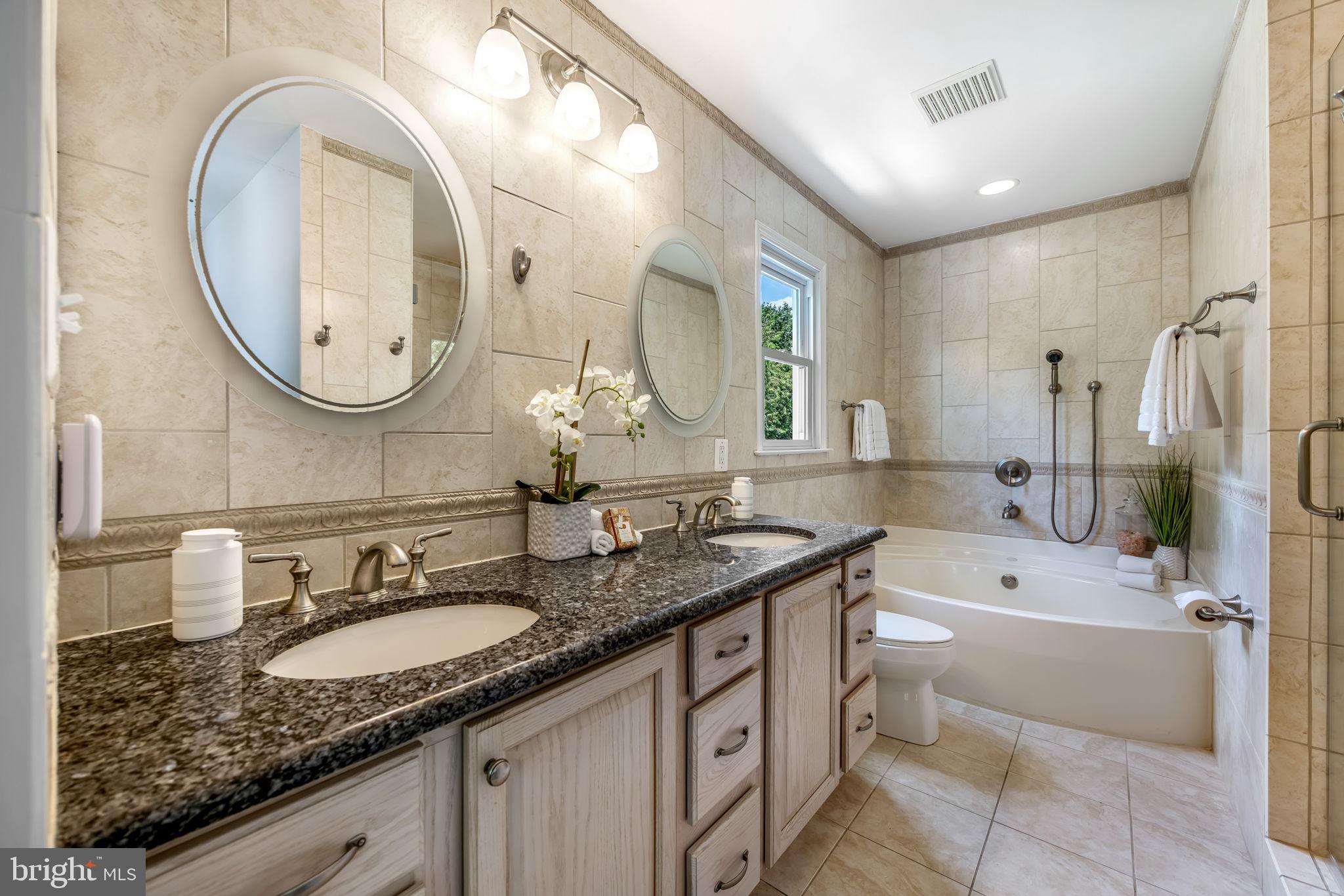 7808 Braemar Way Springfield, VA 22153 - Photo 30 of 47 Primary Bathroom with Soaking Tub & Shower
