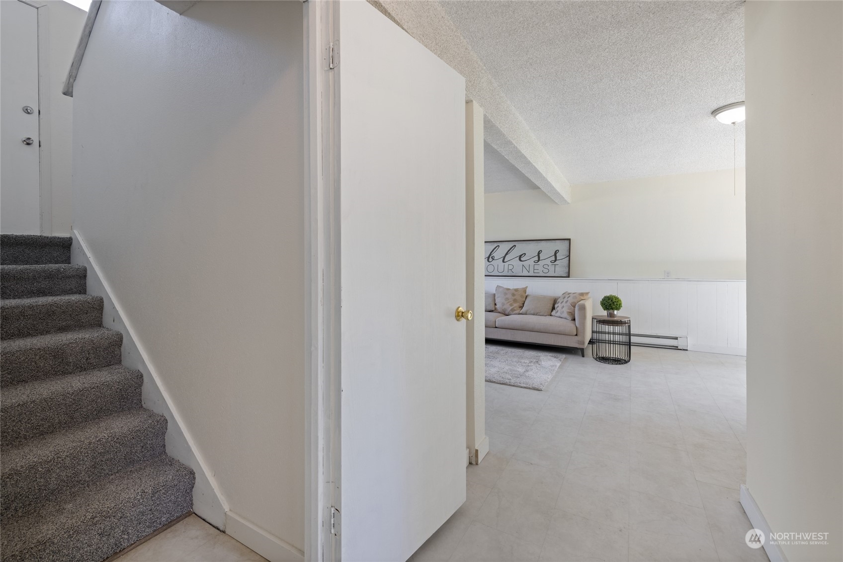 3127 South Walden Street Seattle, WA 98144 - Photo 21 of 39 a view of a livingroom with table and sofas
