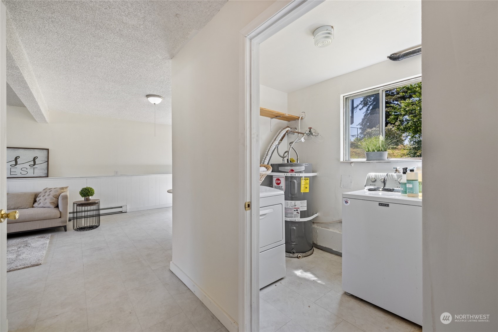3127 South Walden Street Seattle, WA 98144 - Photo 24 of 39 a room with storage and utility
