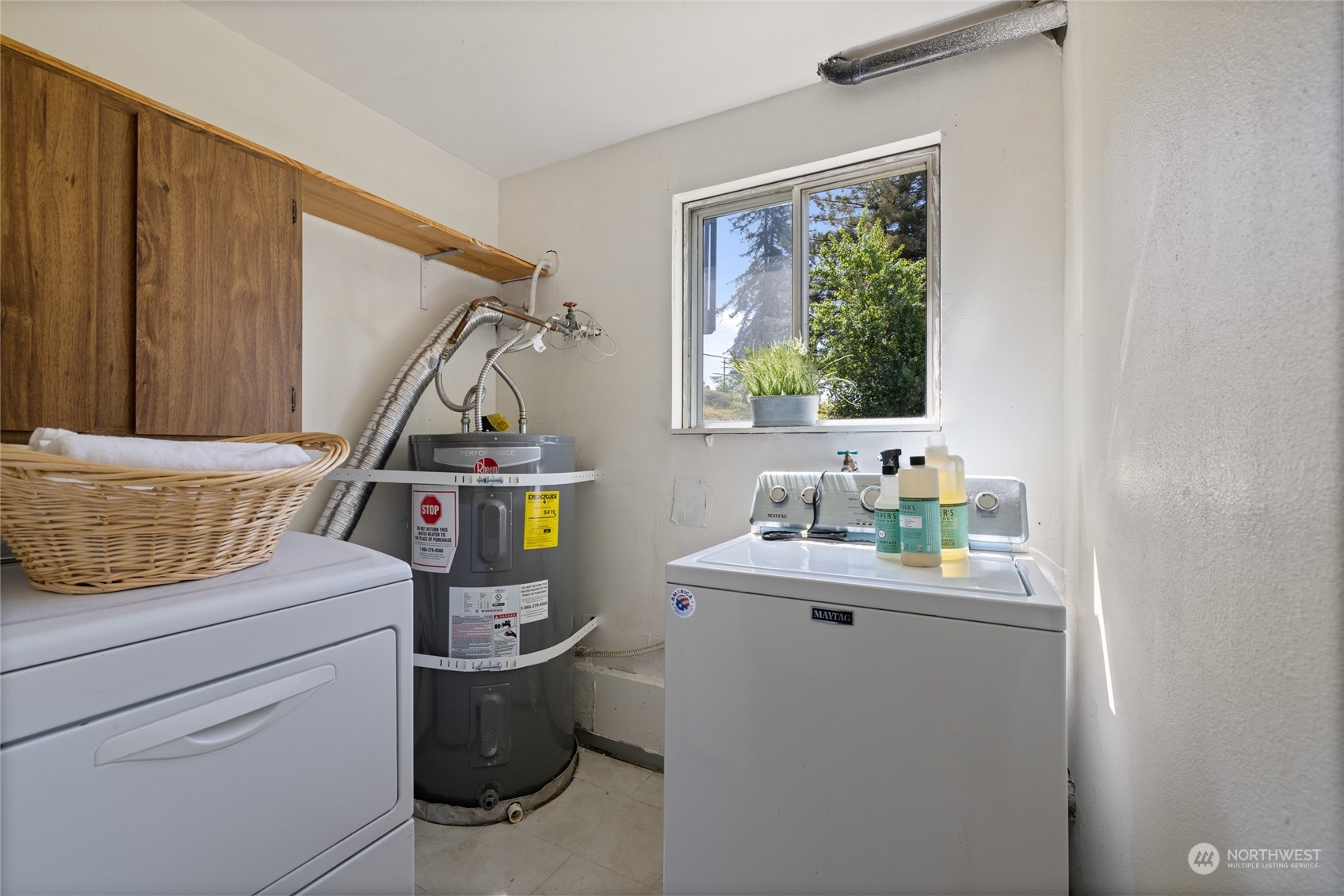 3127 South Walden Street Seattle, WA 98144 - Photo 25 of 39 a room with storage and utility