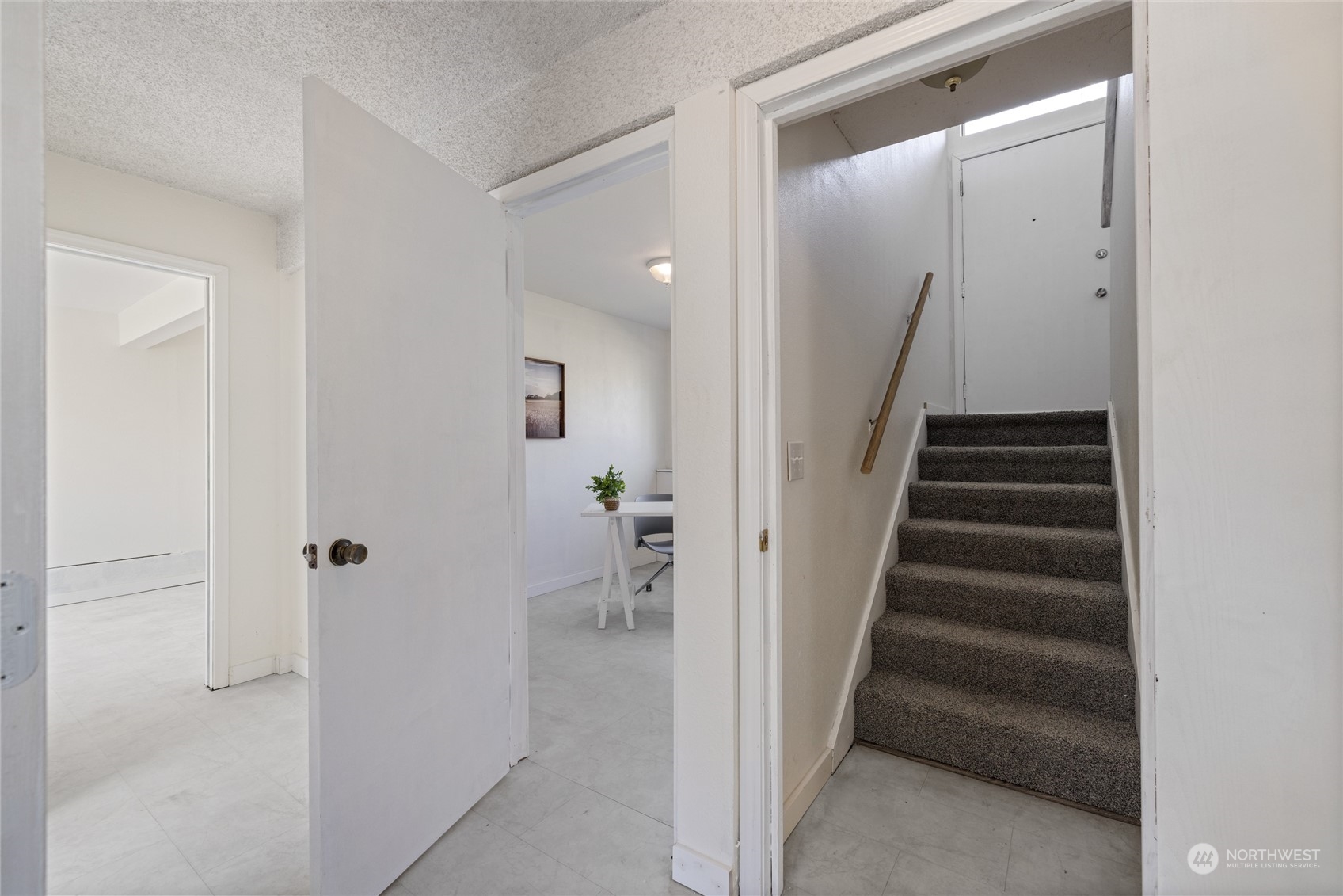 3127 South Walden Street Seattle, WA 98144 - Photo 26 of 39 a view of a hallway with wooden floor and entryway