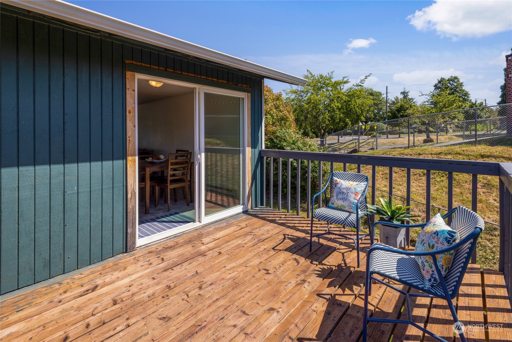 3127 South Walden Street Seattle, WA 98144 - Photo 33 of 39 a view of a balcony with furniture and wooden floor