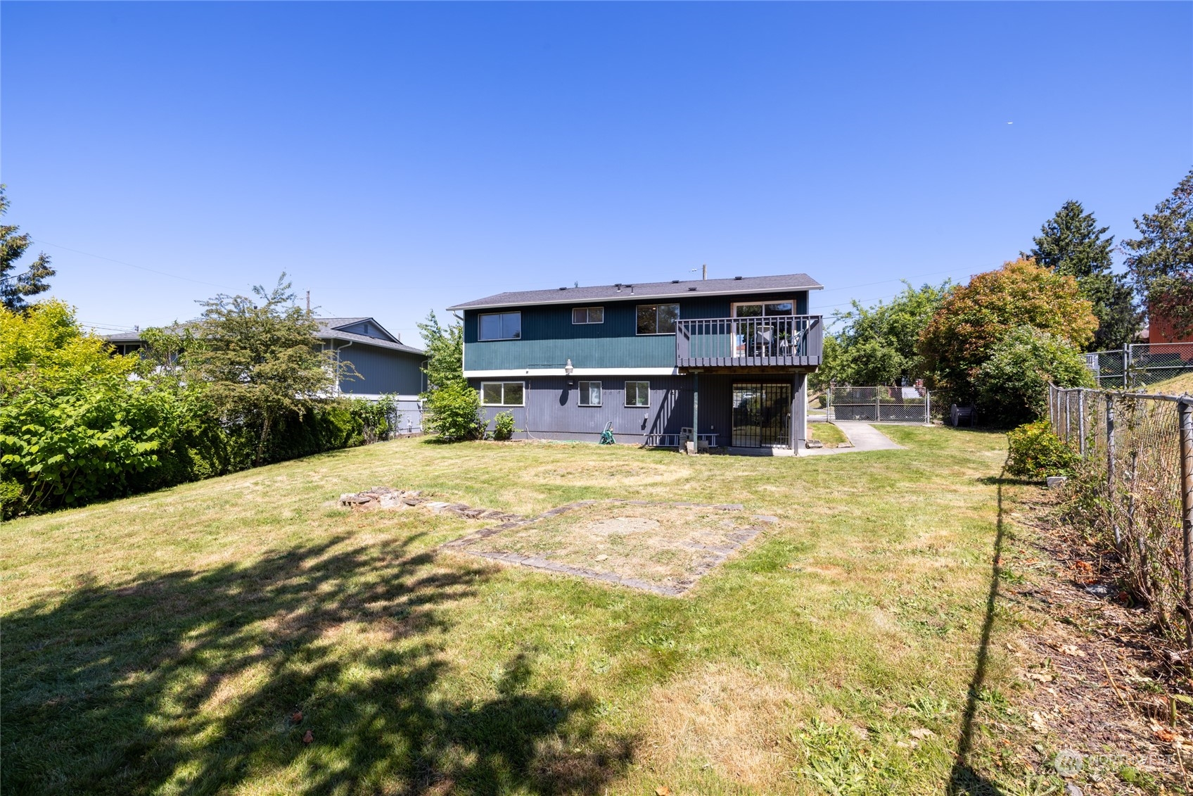 3127 South Walden Street Seattle, WA 98144 - Photo 34 of 39 a view of a house with a yard