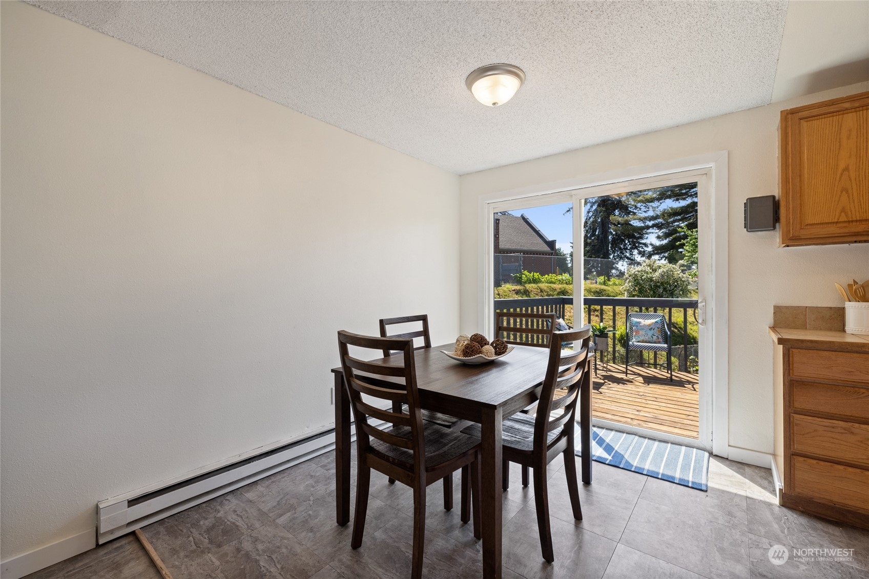 3127 South Walden Street Seattle, WA 98144 - Photo 10 of 39 a view of a dining room with furniture window and outside view