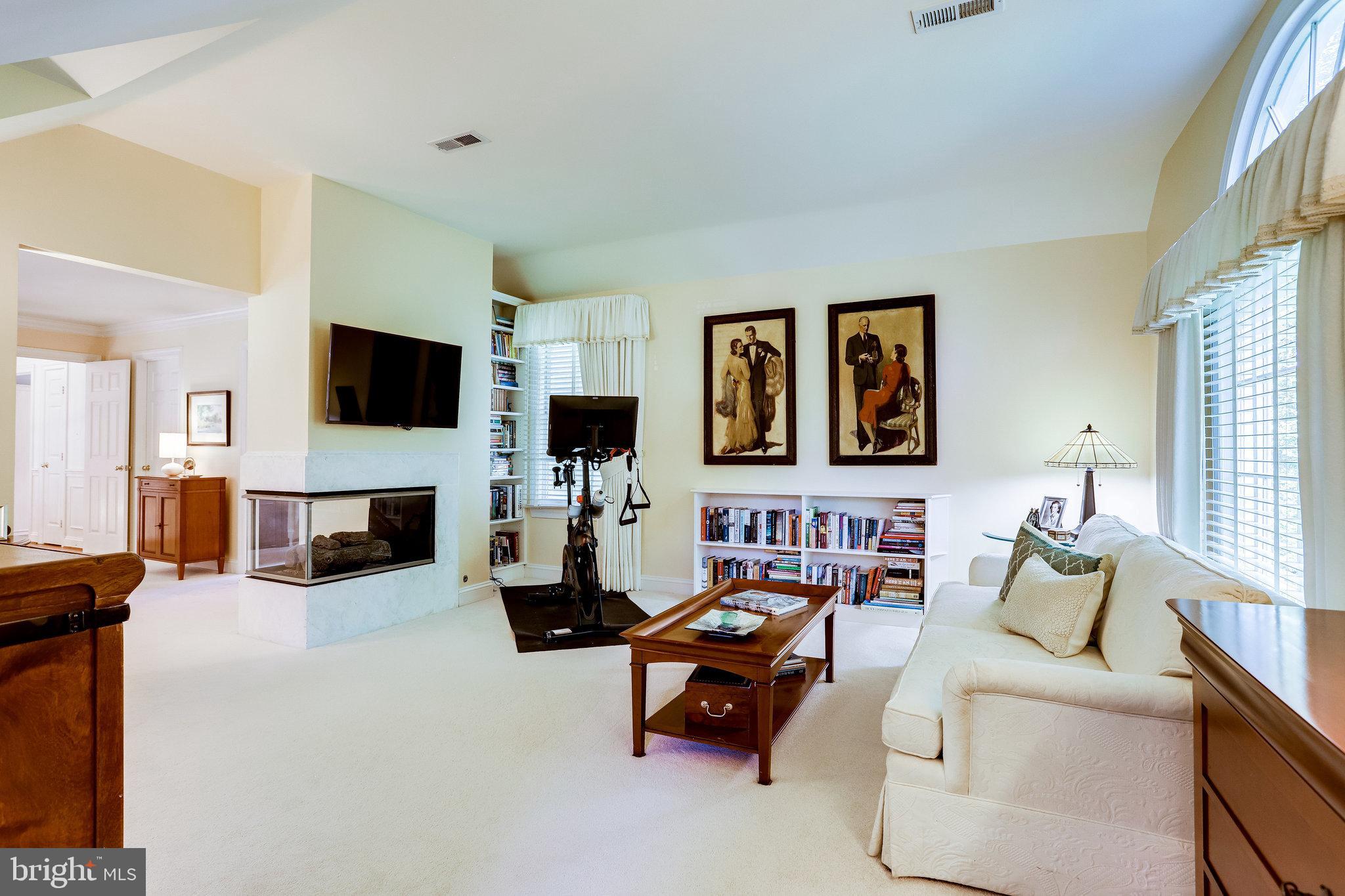 11406 Wild Bramble Way Reston, VA 20194 - Photo 42 of 87 Double-Sided Gas Fireplace-Great Ambiance!