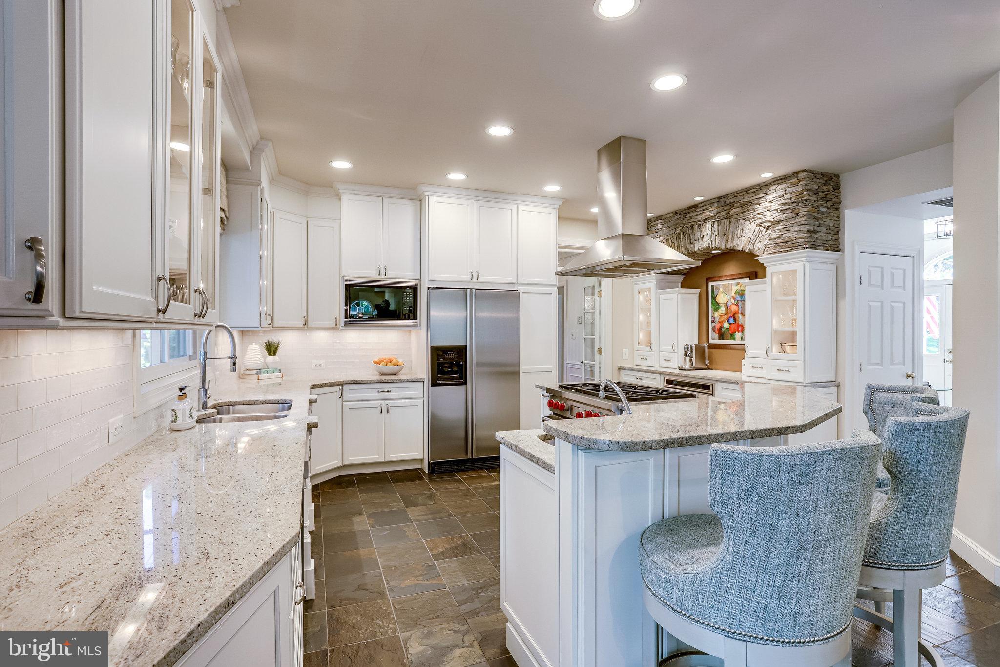 11406 Wild Bramble Way Reston, VA 20194 - Photo 9 of 87 Custom Cabinetry with interior lights! Beautiful!