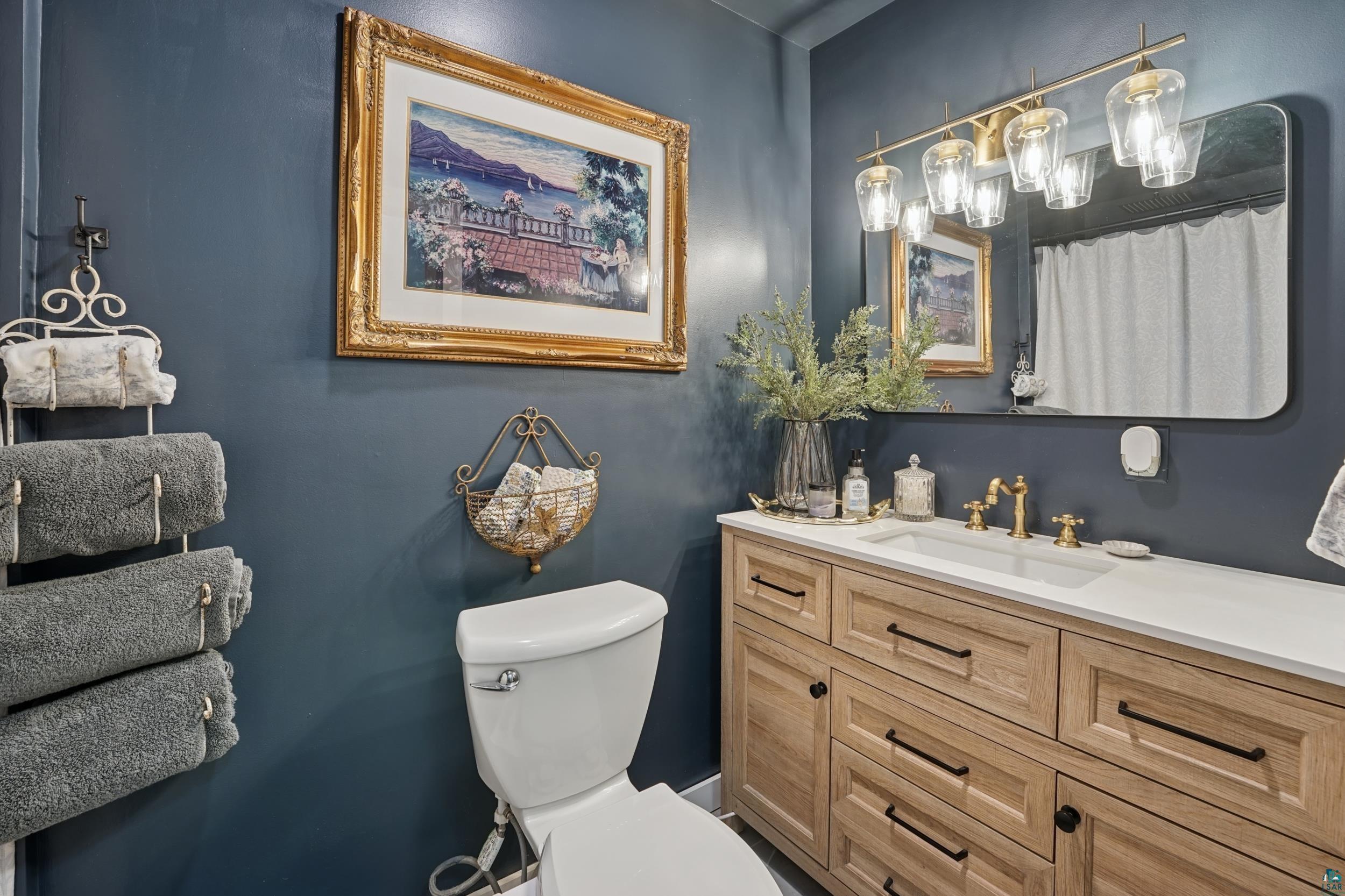 52 Thomson Road Esko, MN 55733 - Photo 11 of 20 Bathroom with a shower with curtain and vanity
