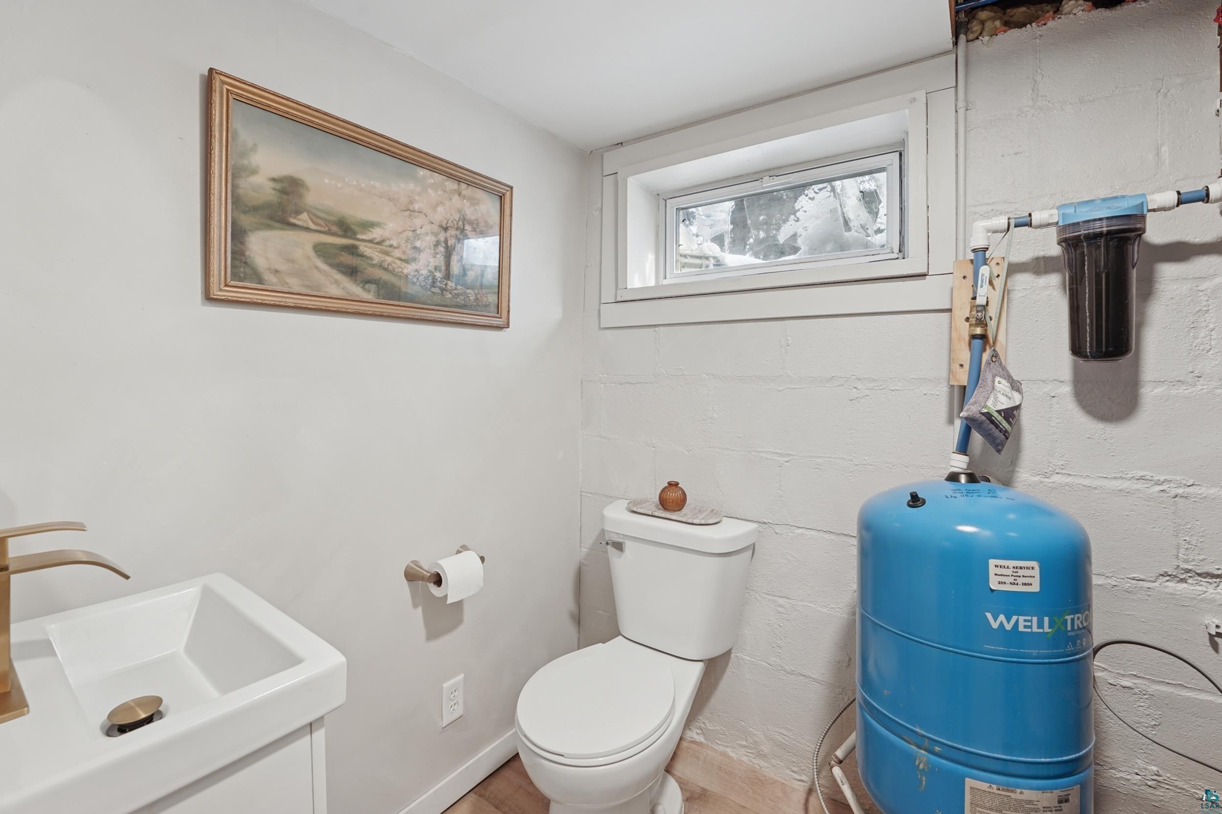 52 Thomson Road Esko, MN 55733 - Photo 12 of 20 Bathroom with toilet and a sink
