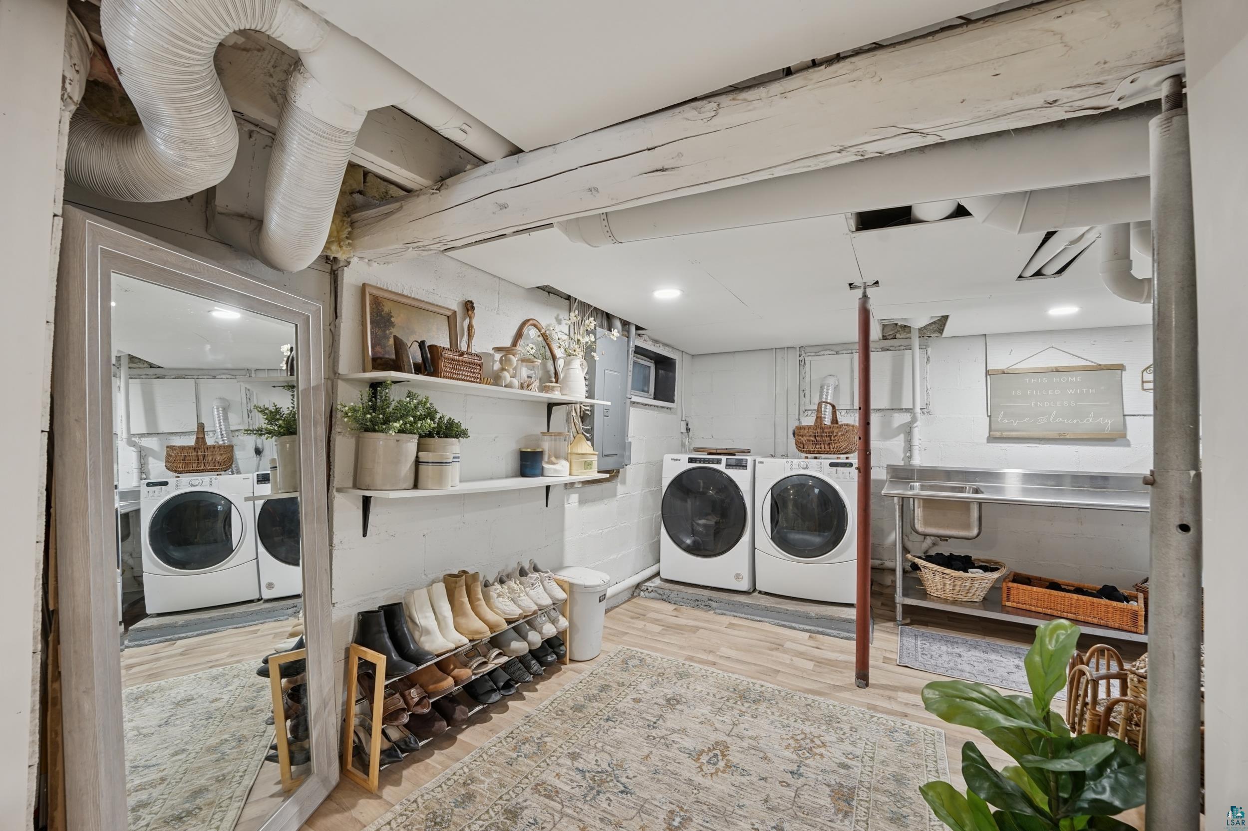 52 Thomson Road Esko, MN 55733 - Photo 16 of 20 Washroom featuring independent washer and dryer, wood finished floors, and electric panel