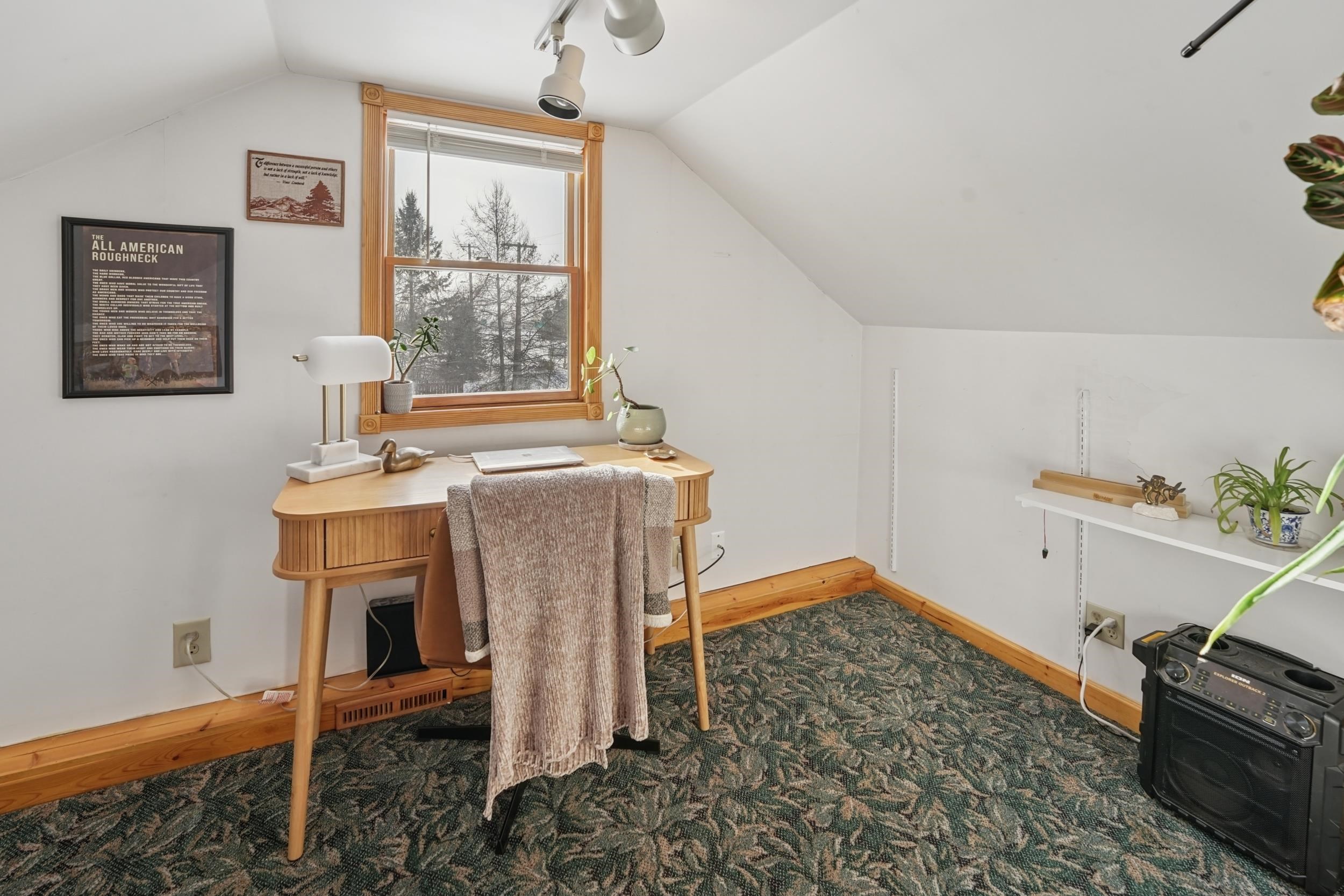52 Thomson Road Esko, MN 55733 - Photo 10 of 20 Home office featuring lofted ceiling, dark carpet, and rail lighting