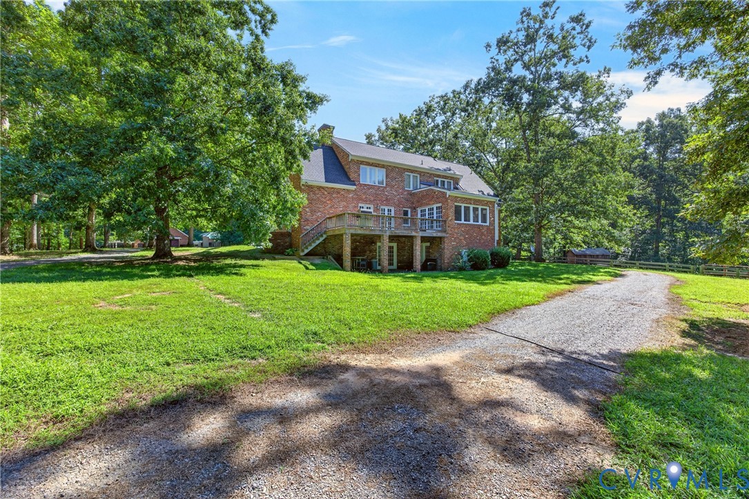 1108 Shallow Well Road Manakin-Sabot, VA 23103 - Photo 64 of 86 Brick exterior with a multi-level deck, gravel dri