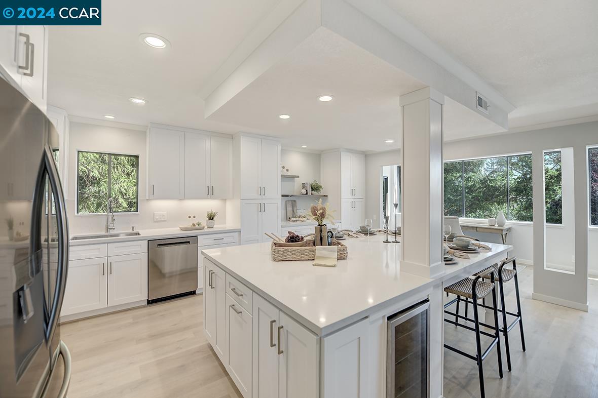 1364 Running Springs Road, Unit 2 Walnut Creek, CA 94595 - Photo 1 of 1 a kitchen with appliances cabinets a sink and a counter top space