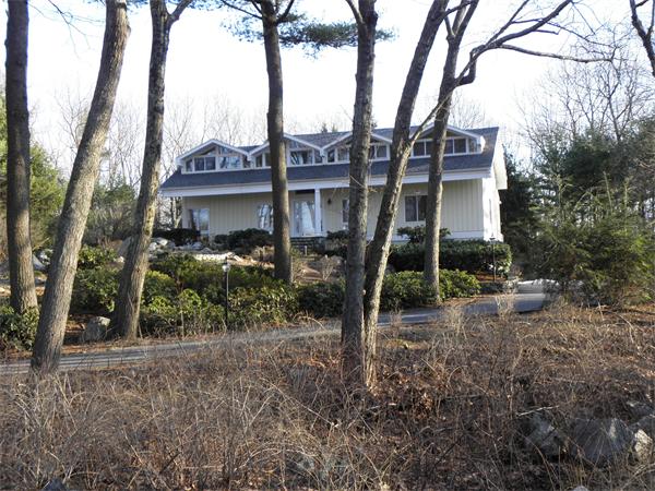 166 Hickory Road Weston, MA 02493 - Photo 1 of 9 a view of a house with a tree and a tree