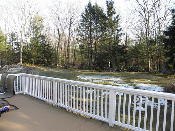 166 Hickory Road Weston, MA 02493 - Photo 6 of 9 a view of balcony with wooden floor and fence