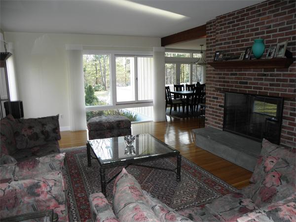 166 Hickory Road Weston, MA 02493 - Photo 8 of 9 a living room with furniture and a fireplace