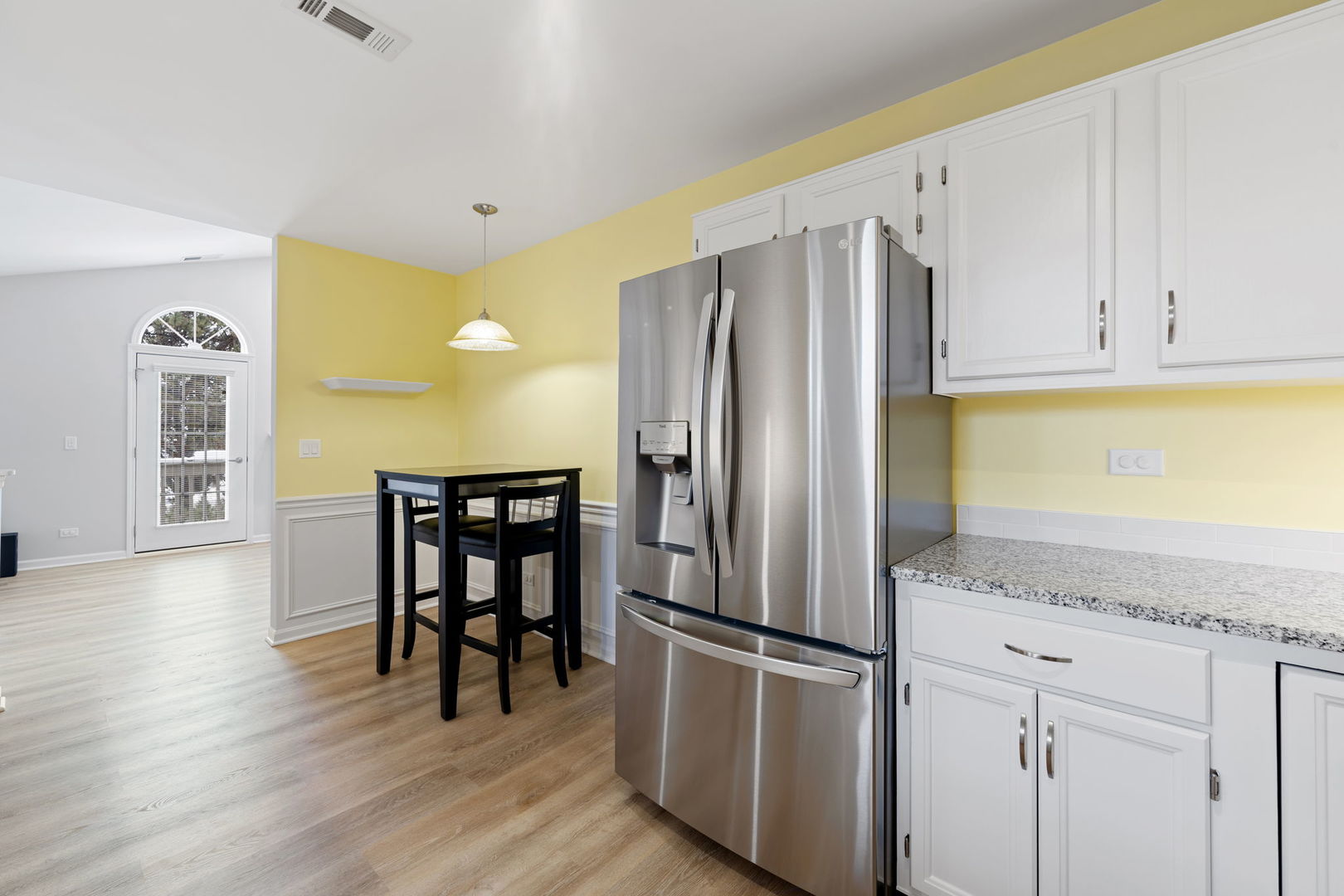 1264 Rhodes Lane Naperville, IL 60540 - Photo 20 of 35 a kitchen with stainless steel appliances granite countertop a refrigerator and a stove top oven