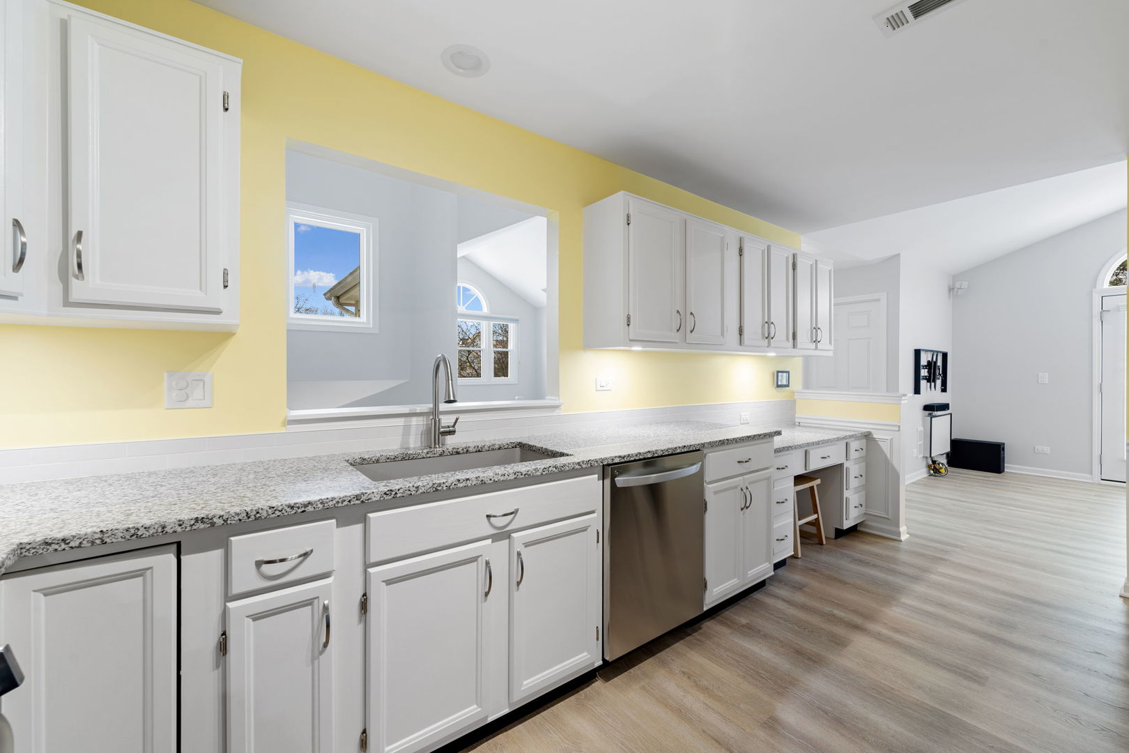 1264 Rhodes Lane Naperville, IL 60540 - Photo 22 of 35 a kitchen with a sink and cabinets