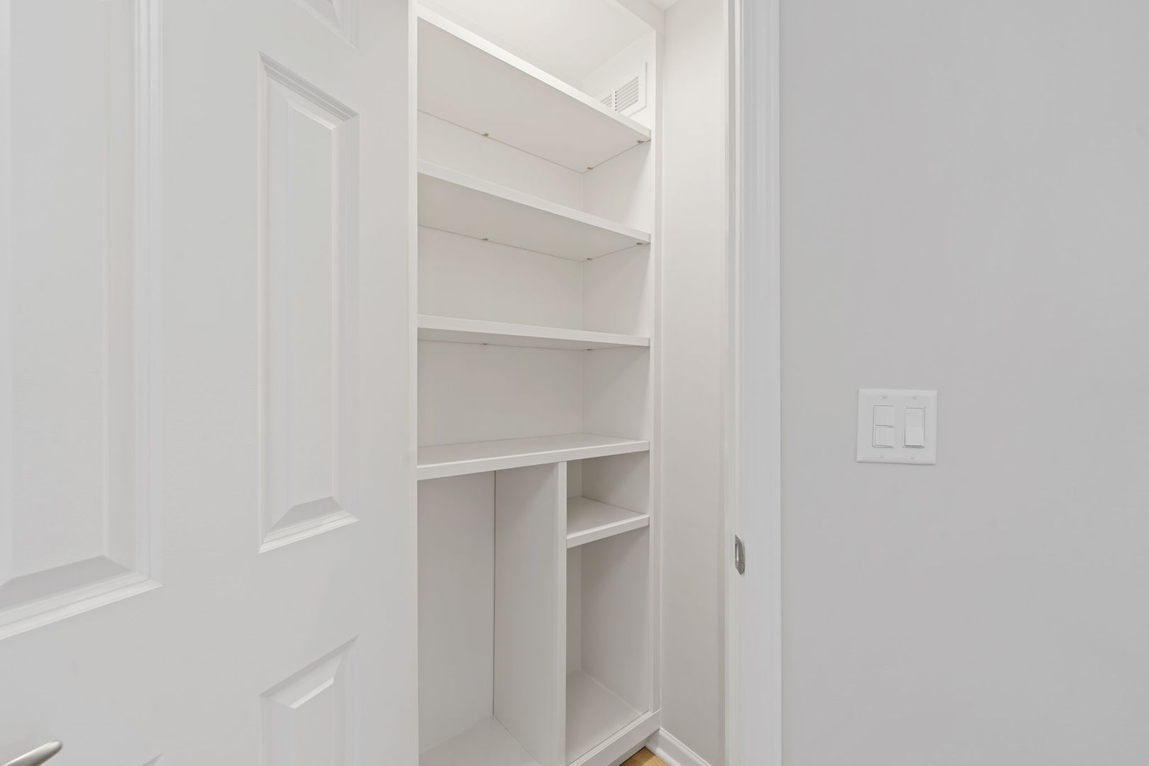 1264 Rhodes Lane Naperville, IL 60540 - Photo 27 of 35 a view of walk in closet with empty racks