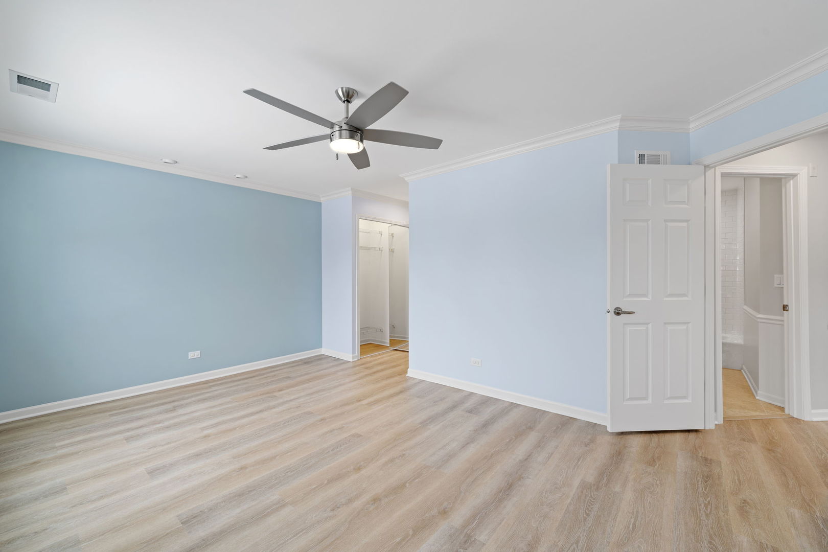 1264 Rhodes Lane Naperville, IL 60540 - Photo 28 of 35 a view of an empty room and wooden floor