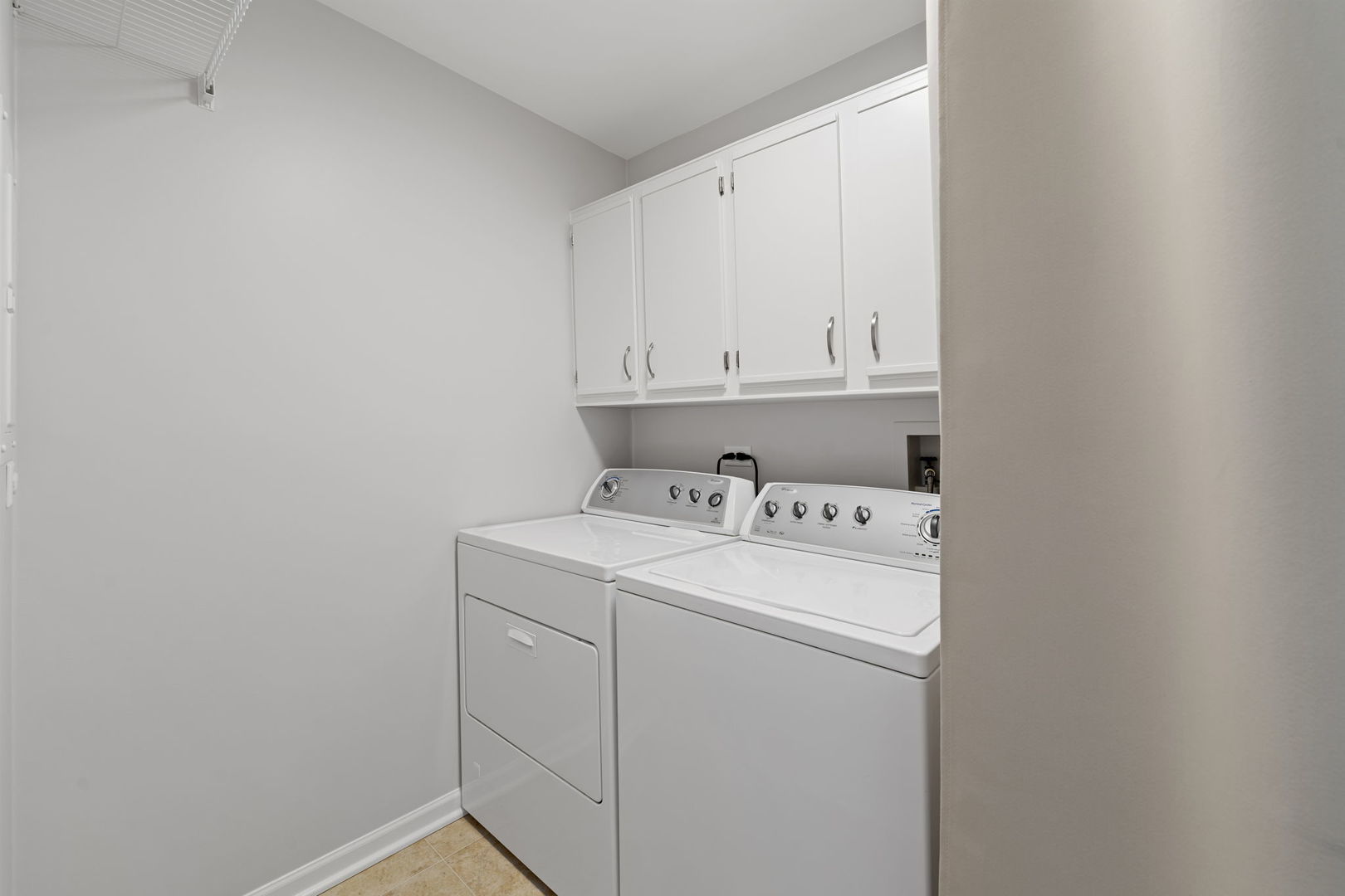 1264 Rhodes Lane Naperville, IL 60540 - Photo 34 of 35 a view of storage and utility room with washer and dryer
