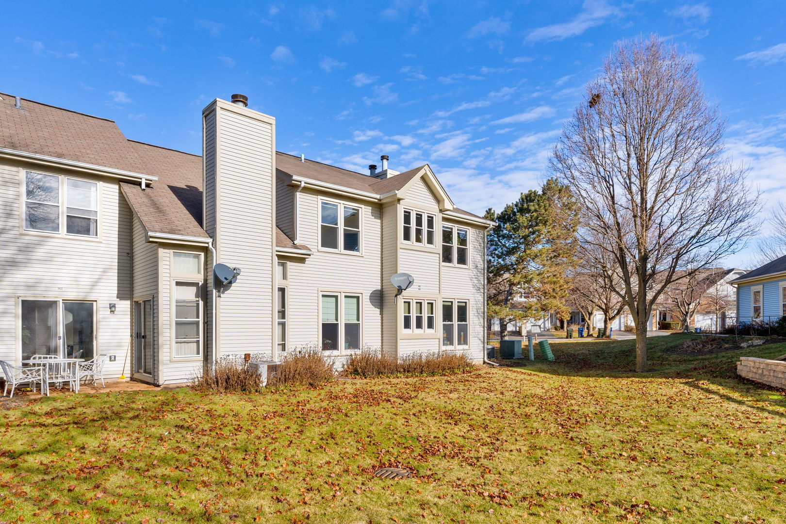 1264 Rhodes Lane Naperville, IL 60540 - Photo 7 of 35 a front view of a house with a yard