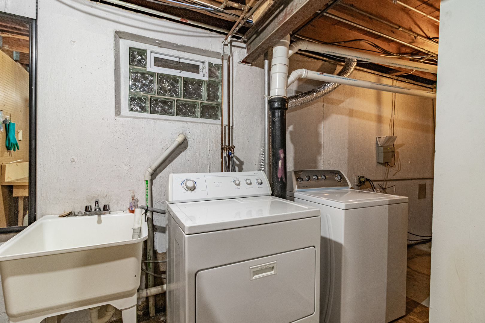 1979 Dundee Road Northbrook, IL 60062 - Photo 23 of 28 a utility room with dryer and washer