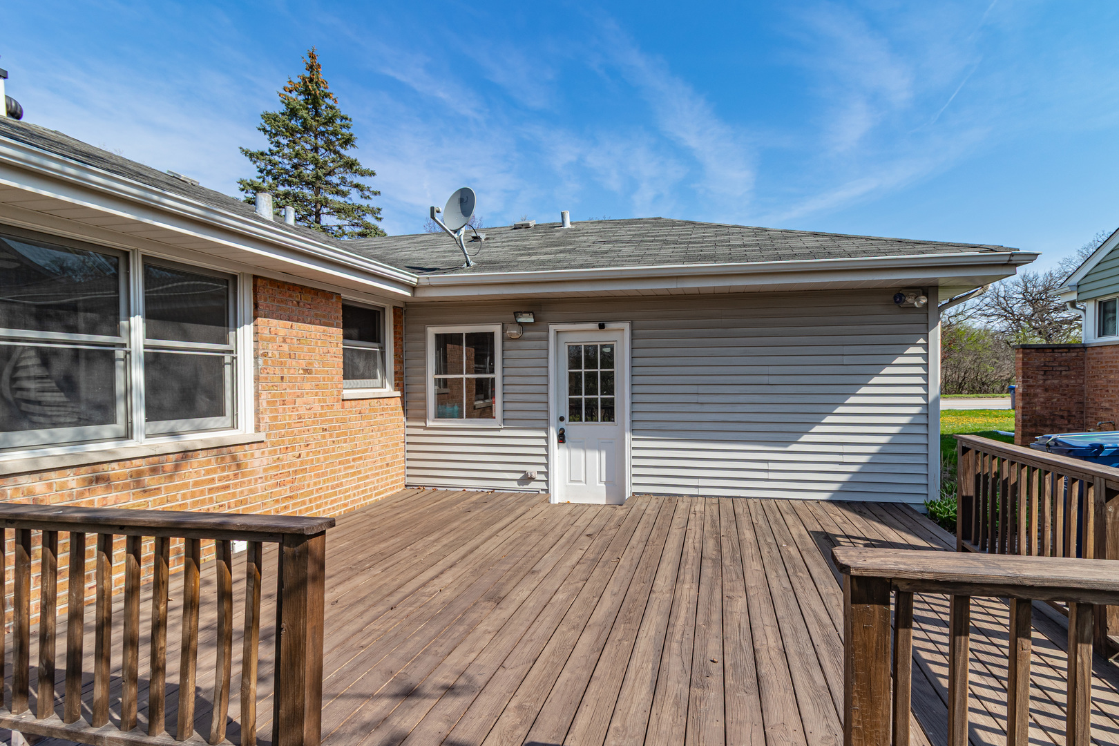 1979 Dundee Road Northbrook, IL 60062 - Photo 25 of 28 a view of a house with wooden deck front of house