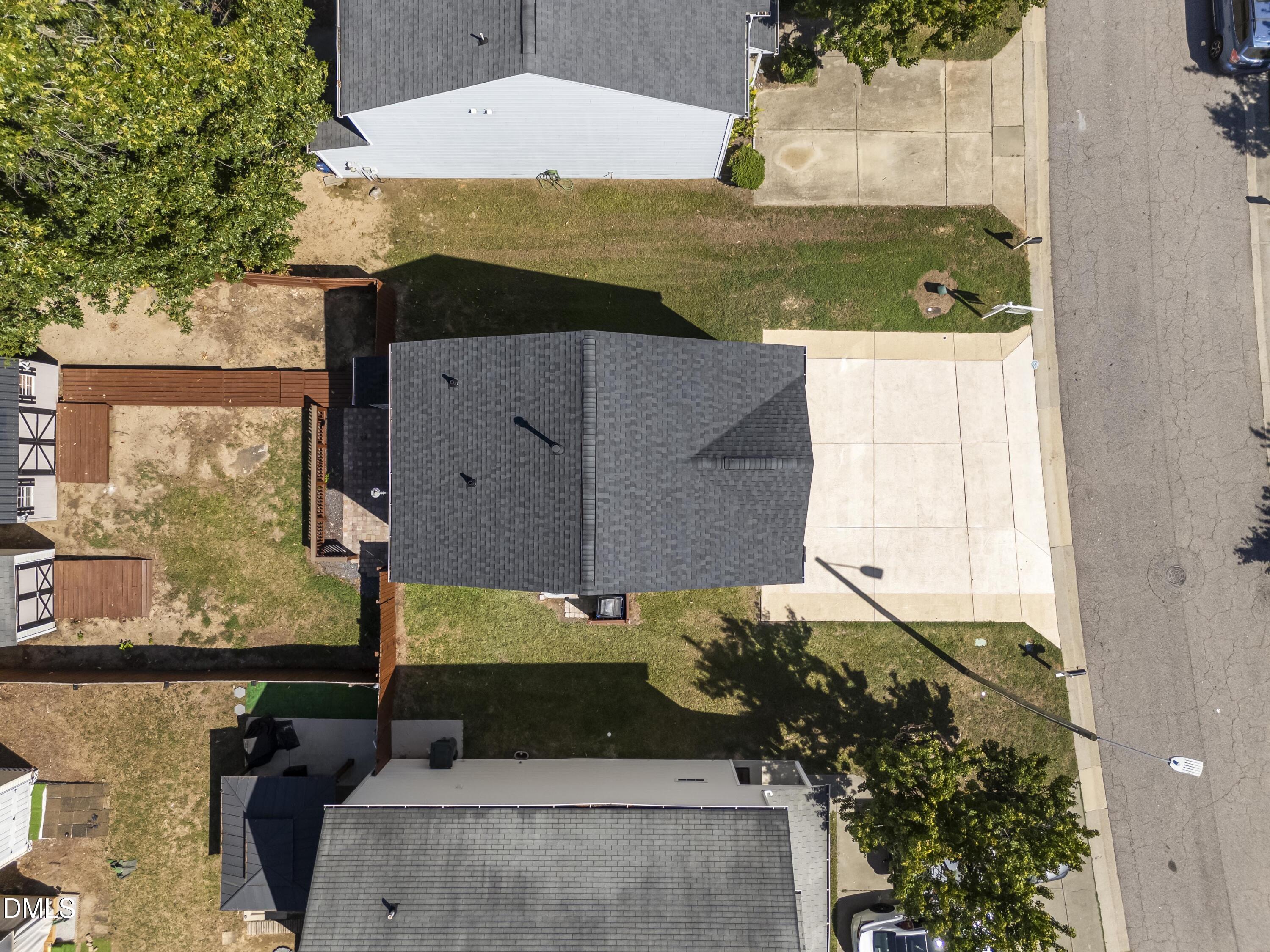 4121 Tensity Drive Raleigh, NC 27604 - Photo 29 of 34 Aerial view of the home, driveway and lot