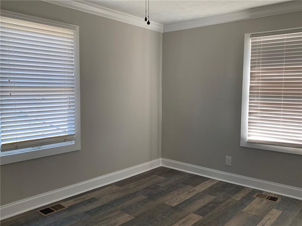 1261 Concord Road Southeast Smyrna, GA 30080 - Photo 13 of 50 a room that has a window in it