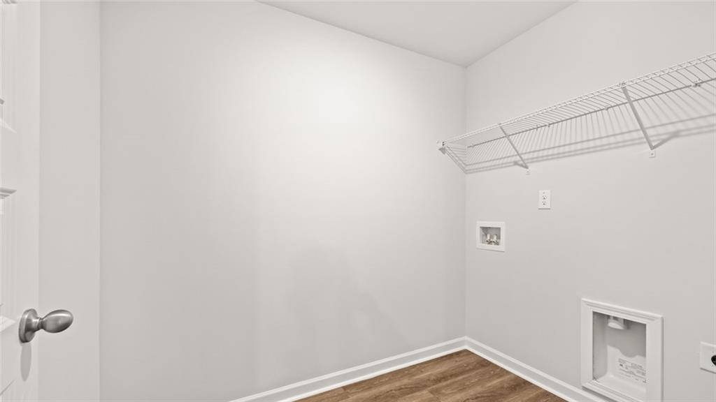 113 Oakchase Pk Lane Hampton, GA 30228 - Photo 27 of 34 a view of a small space with racks on the wall