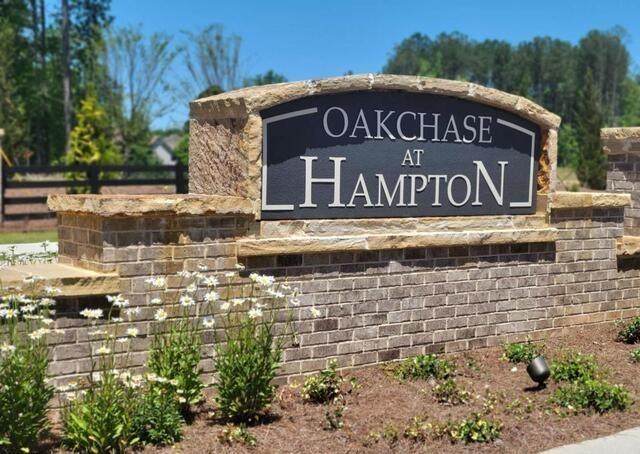 113 Oakchase Pk Lane Hampton, GA 30228 - Photo 29 of 34 a view of a blue sign of a park