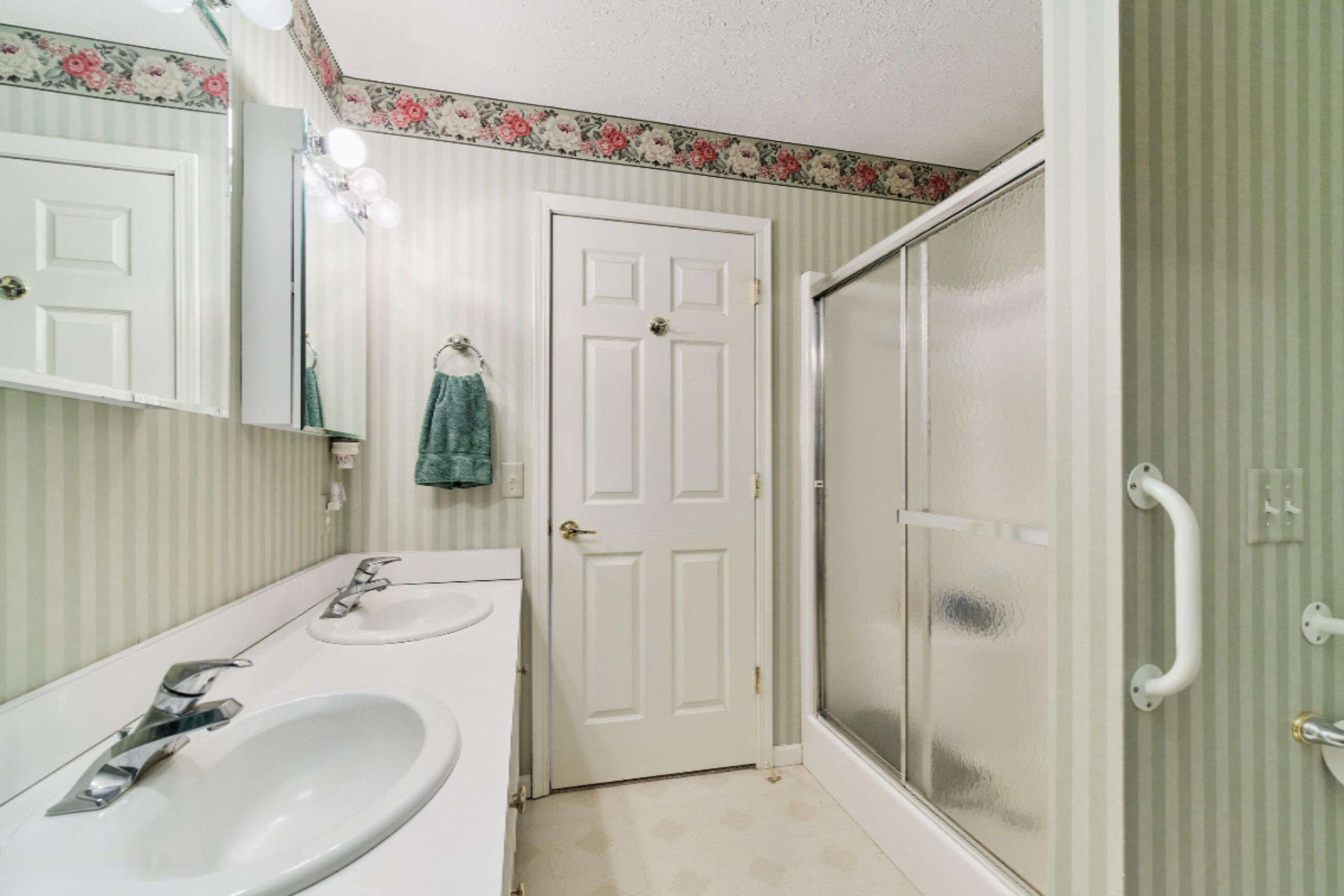 9800 Emerald Ridge Trail Onekama, MI 49675 - Photo 26 of 66 Shower in master bath