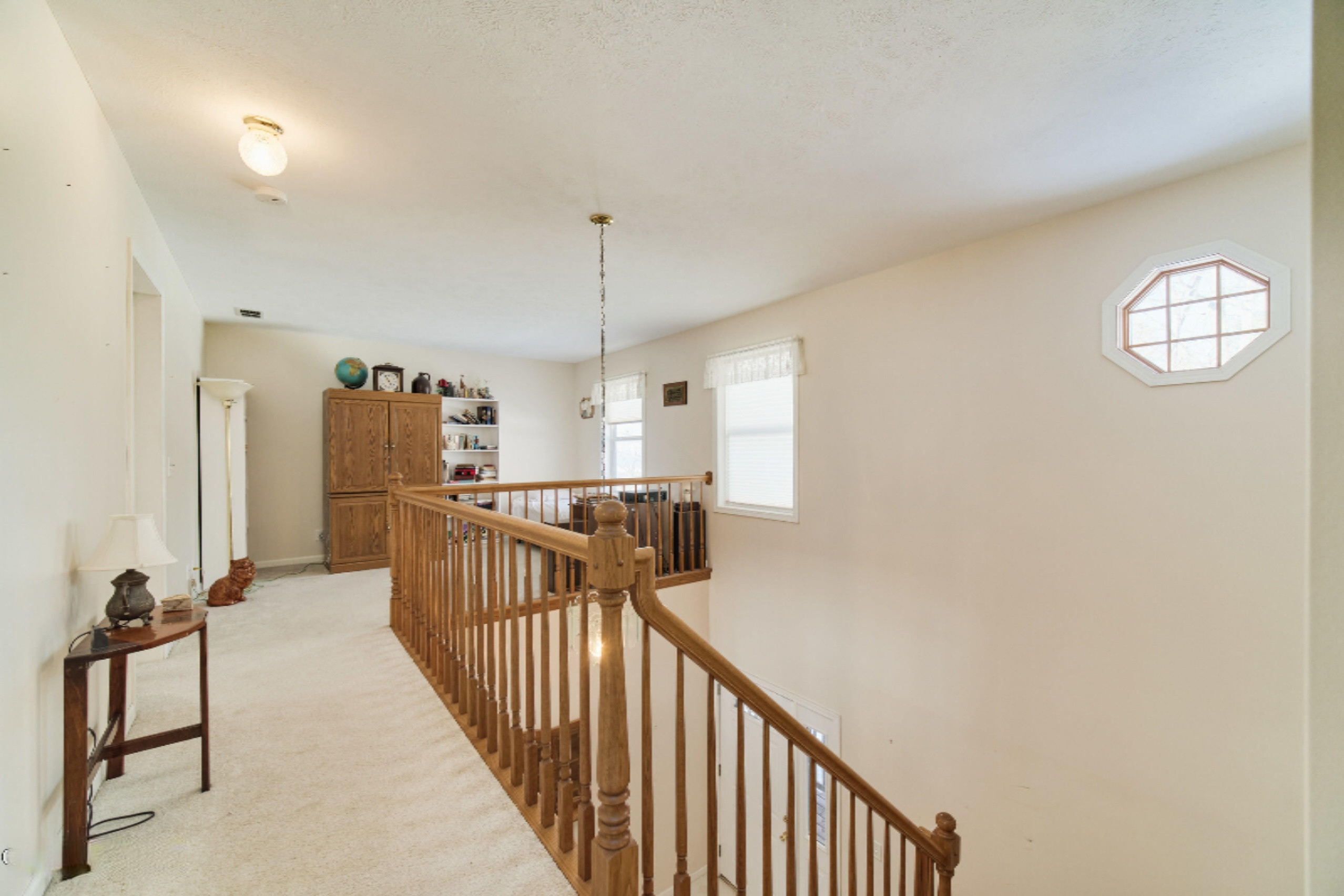 9800 Emerald Ridge Trail Onekama, MI 49675 - Photo 29 of 66 Top of open stairway