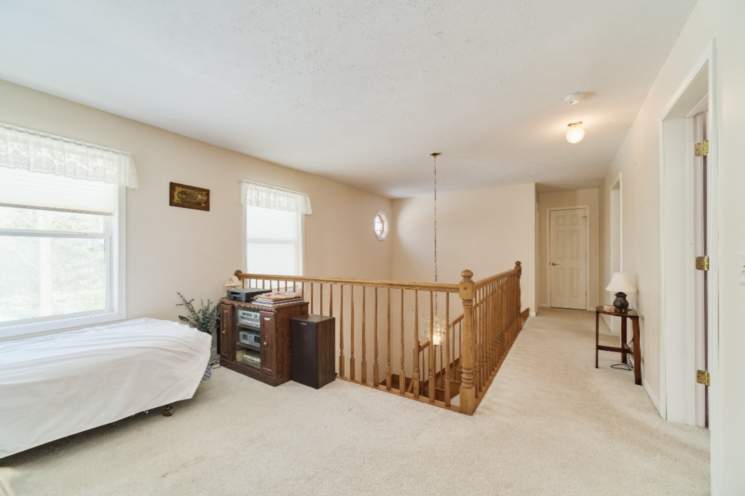 9800 Emerald Ridge Trail Onekama, MI 49675 - Photo 31 of 66 Upstairs loft area