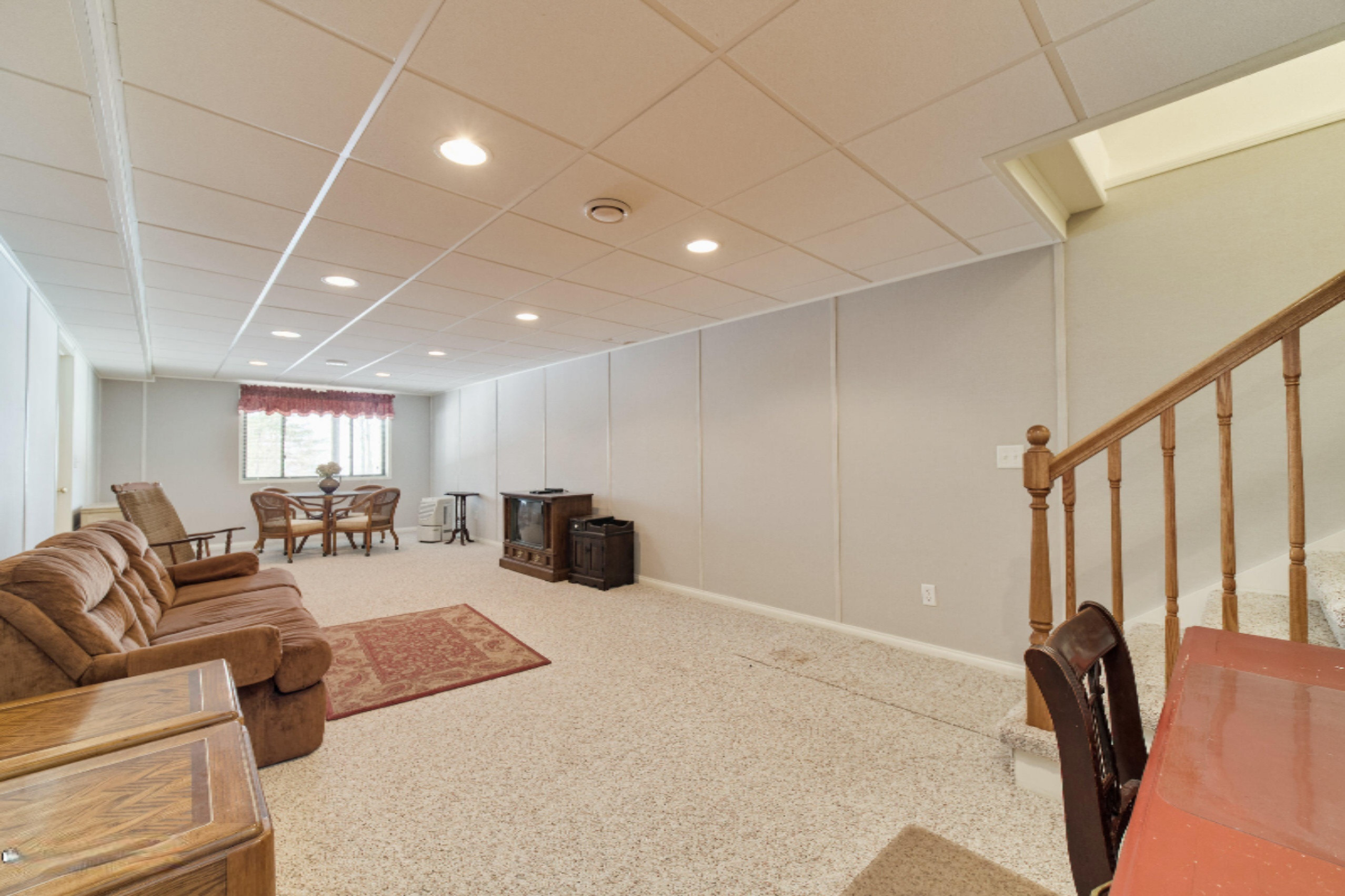 9800 Emerald Ridge Trail Onekama, MI 49675 - Photo 38 of 66 Lower level walk out rec room