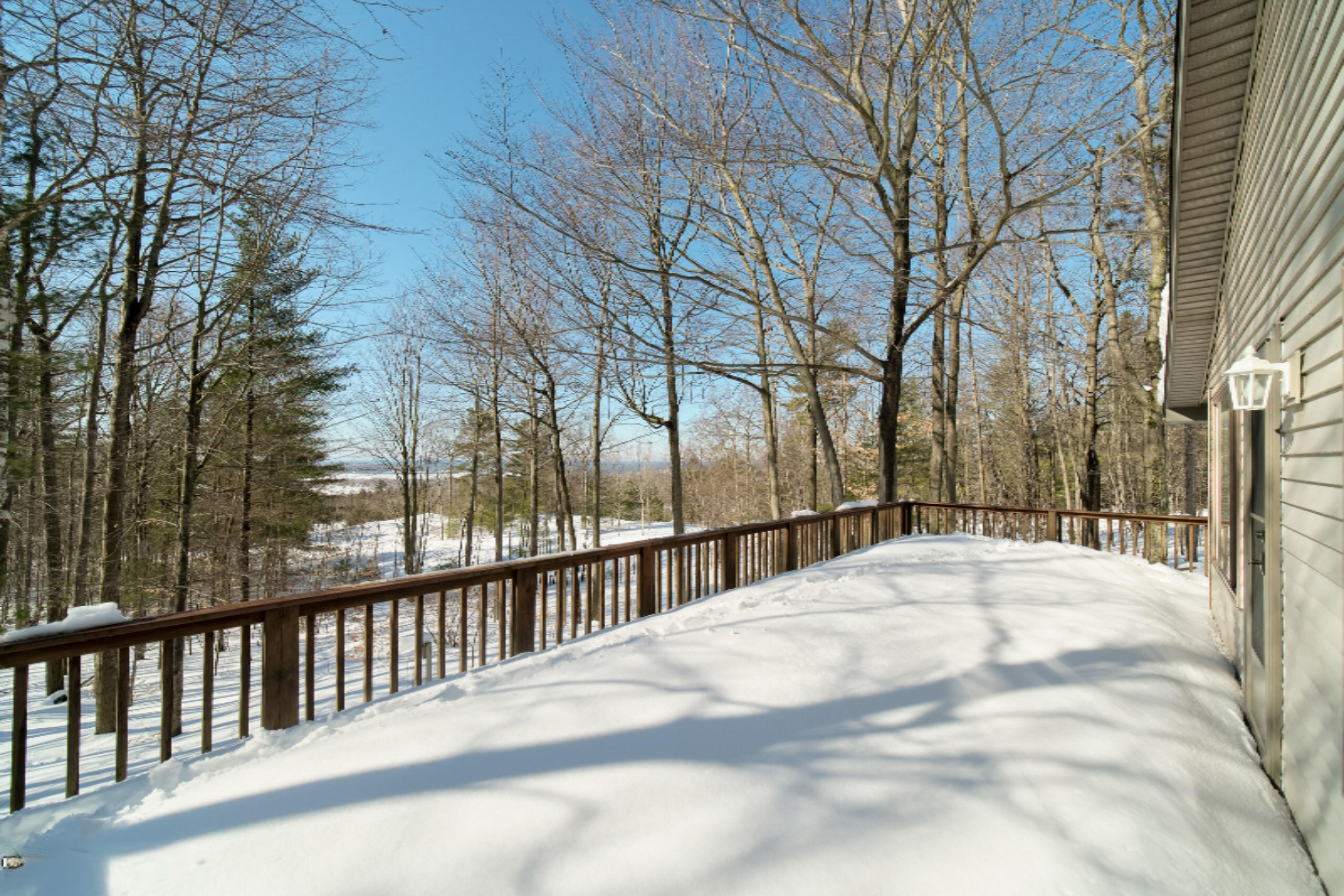 9800 Emerald Ridge Trail Onekama, MI 49675 - Photo 59 of 66 Expansive deck and views