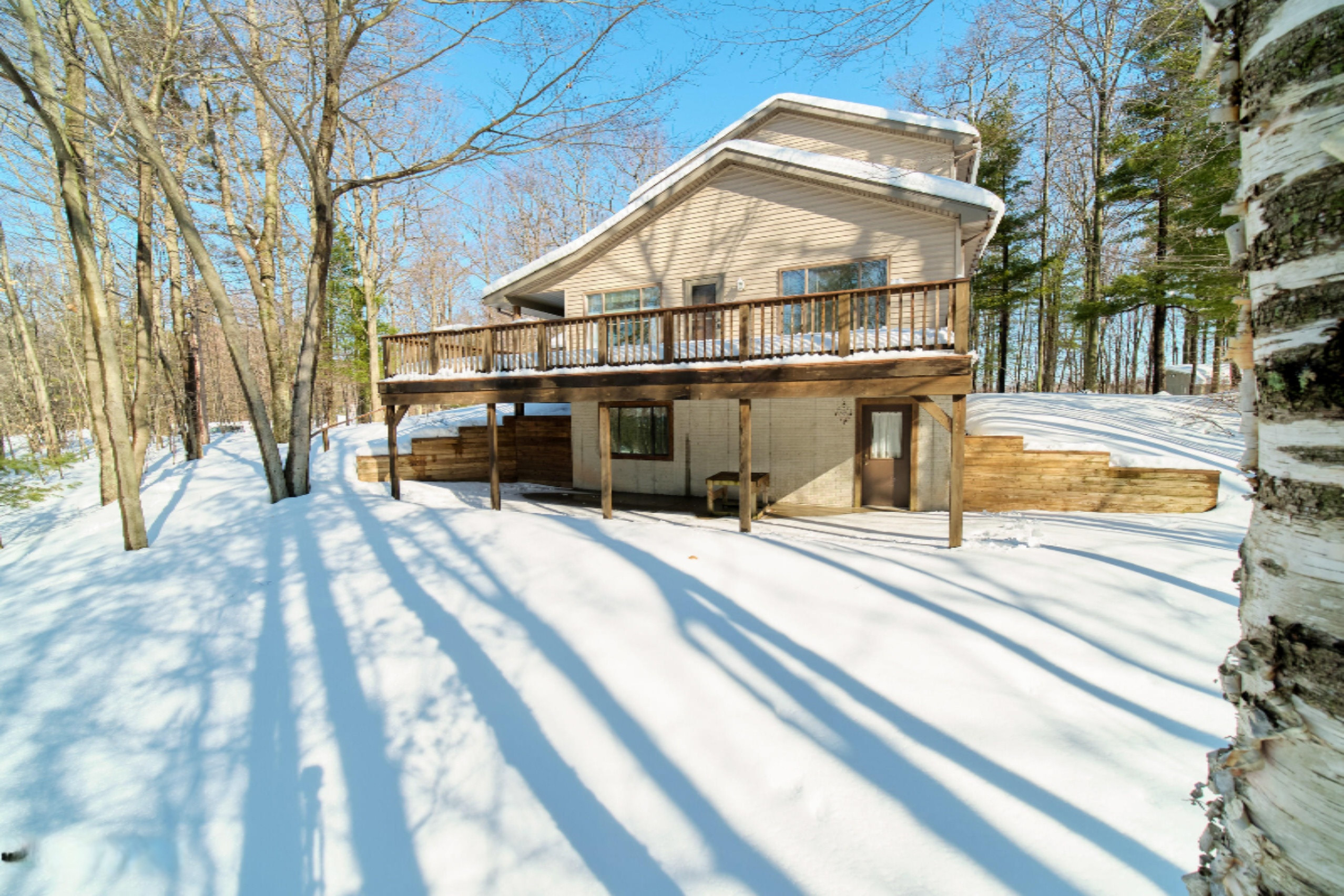 9800 Emerald Ridge Trail Onekama, MI 49675 - Photo 61 of 66 Terraced walls at walk out