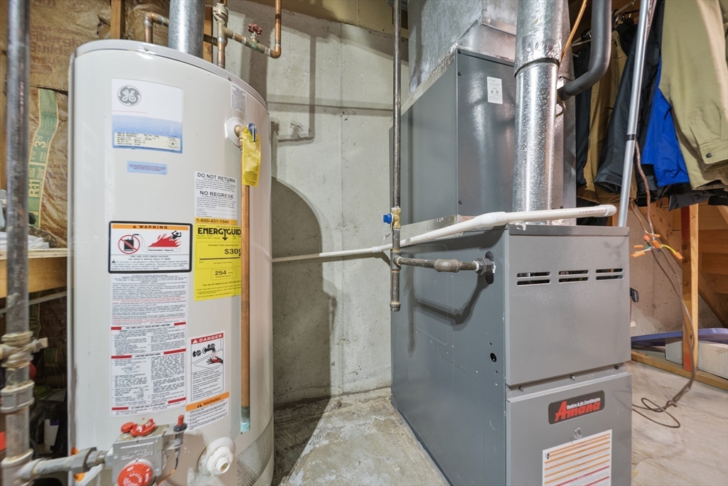 45 Washington Street, Unit 55 Methuen, MA 01844 - Photo 30 of 36 a utility room with dryer and washer